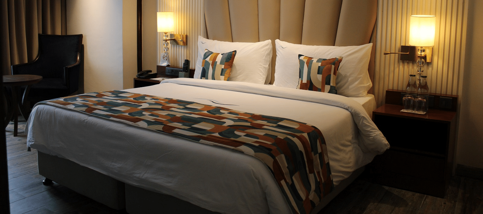 A bedroom featuring a functional working space for productivity at BluSalzz Residence, Amritsar